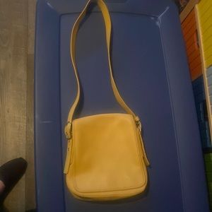 Coach purse Yellow never carried